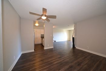 4250 Coldwater Canyon unfurnished living area with wooden floors and ceiling fan